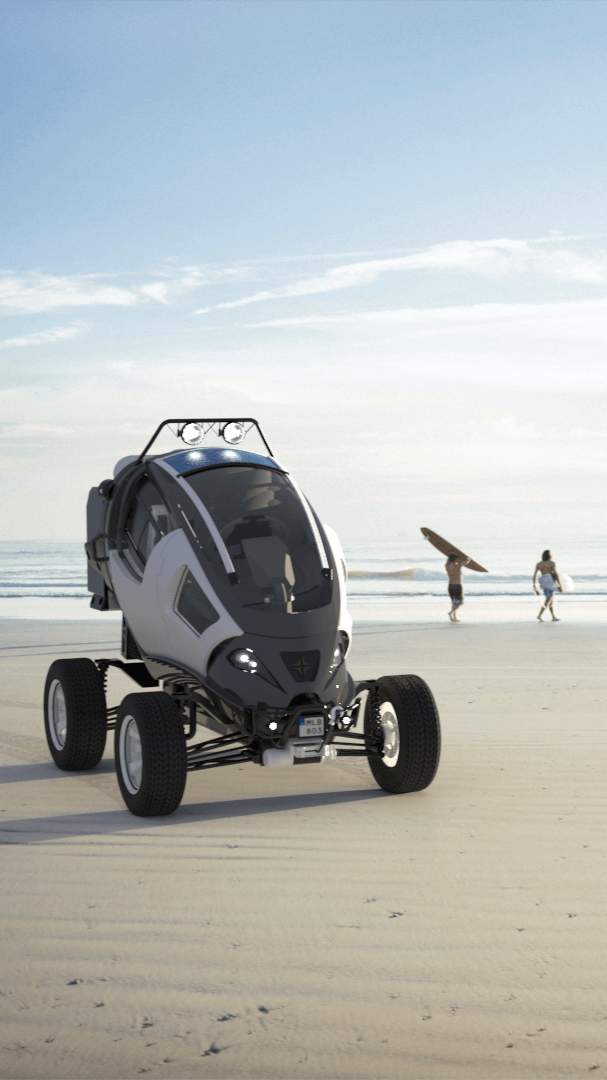 Light grey terrain vehicle on a beach with two surfers walking out to the water.